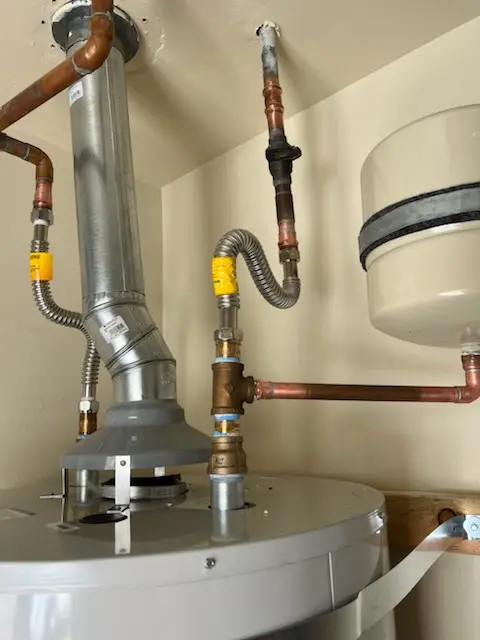 Water heater installation and plumbing repair in Lansing